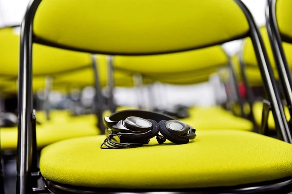 Translation headphones on a chair — Stock Photo, Image