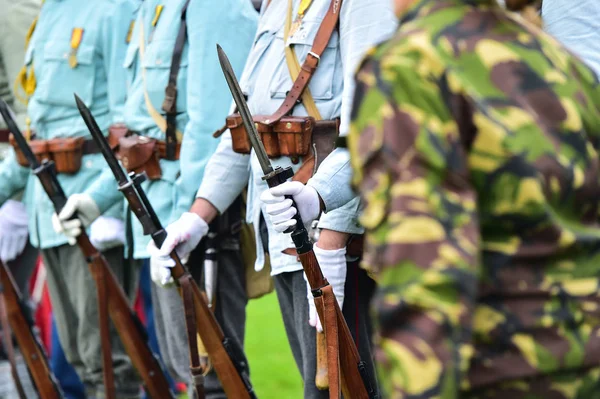 Soldiers in uniforms during military reenactment — Stock Photo, Image
