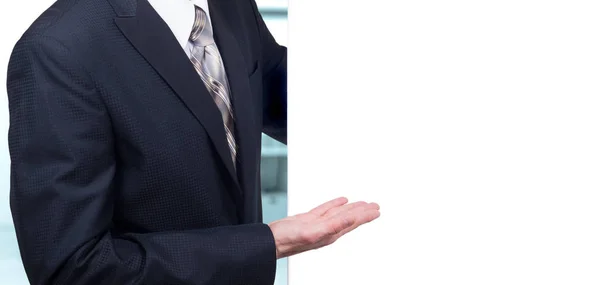 Business man presenting over a white background — Stock Photo, Image