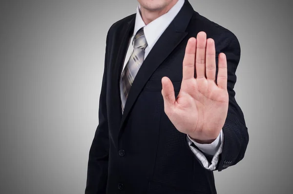gri arka plan üzerinde elleriyle işadamı jest