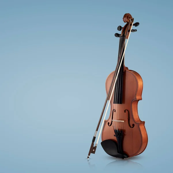 Violino instrumentos musicais de orquestra closeup em azul — Fotografia de Stock