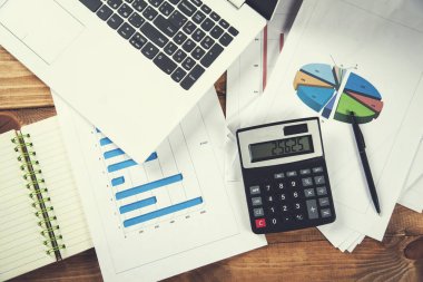 calculator with computer on graph