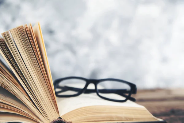 Glasses on book — Stock Photo, Image