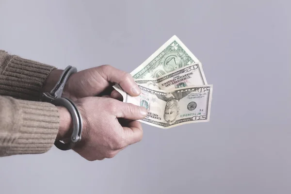 Man Hand Handcuffs Money Grey Background — Stock Photo, Image