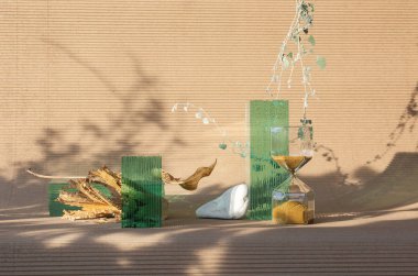 Cam, taş, kuru çiçek ve kum saatinin geometri bileşimi