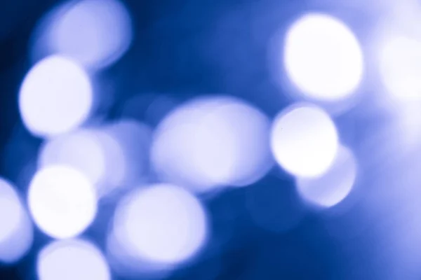 stock image Defocused soft lights Shot Of Colorful classic blue pantone Abstract Background Out of focus light dots, Bokeh 