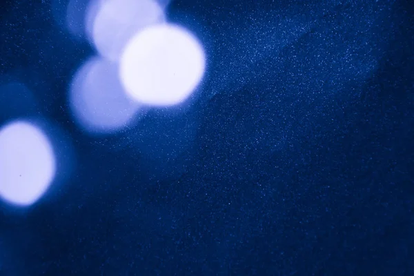 Defocused soft lights Shot Of Colorful classic blue pantone Abstract Background Out of focus light dots, Bokeh