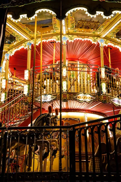 Carousel merry-go-round with light at night — 스톡 사진