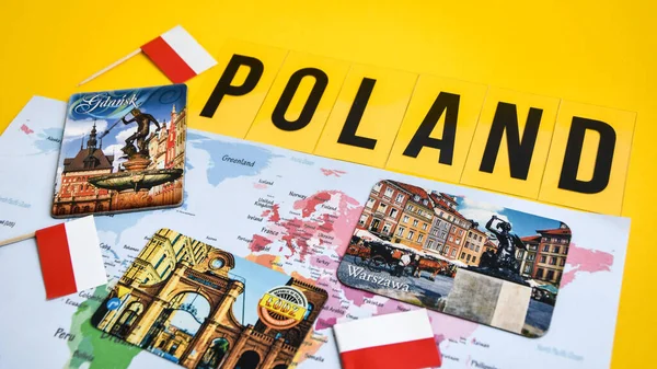 Poland travel destination, polish flag, magnets from Warsaw, Gdansk Lodz, world map, travel concept, EU