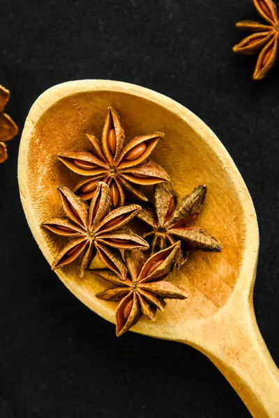 Wooden Spoon Star Anise Black Background Christmas Spices — Stock Photo, Image