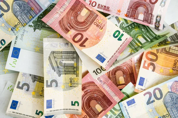 pile of paper euro banknotes as part of the united country's payment system, Euro European currency - money, top view, Euro Money. euro cash background