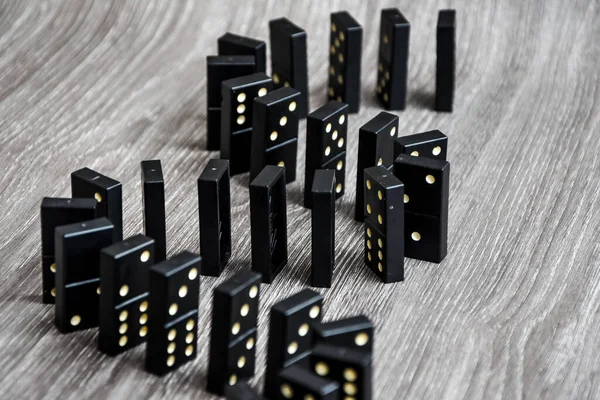 Black Dominoes Light Wooden Table Stand Row Selective Focus Black — Stock Photo, Image