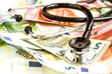 stethoscope and the euro banknotes, Medical cost concept - Stethoscope on euro paper money bank notes Euro banknotes background : Banking Account, Investment Analytic research data economy, trading, Business company concept.