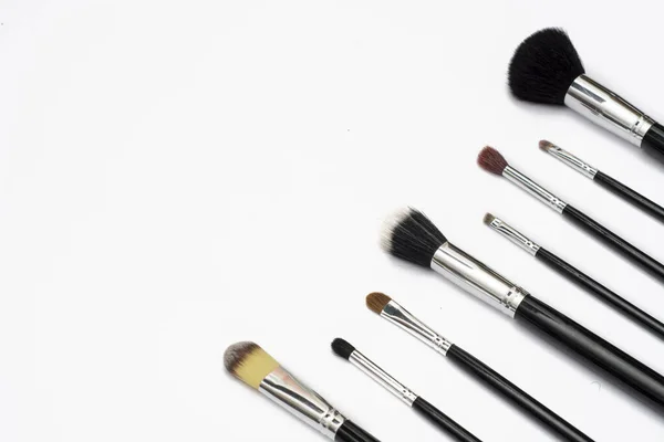 パンフレットDe Maquillaje Acomodadas Manera Estica Sobore Fondo Blanco — ストック写真