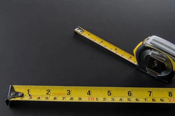 Flexometer Meter Silver Color Yellow Tape Measure Black Background — Stock Photo, Image