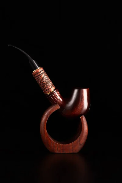 Tobacco pipe isolated on black background. — Stock Photo, Image