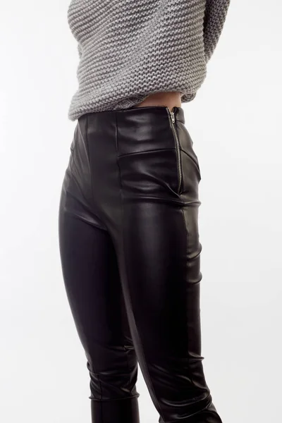 Close-up of black leather pants and hand — 스톡 사진