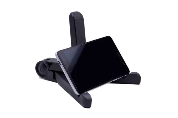 Foldable mobile phone or tablet holder or stand isolated on white background — 스톡 사진