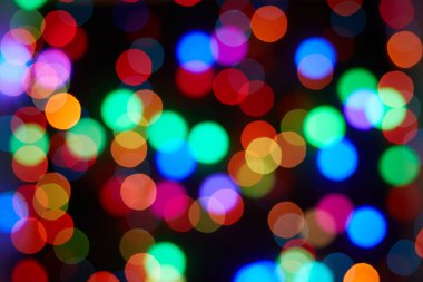 Kırmızı ve turuncu, yeşil, mavi tatil bokeh. Soyut arkaplan