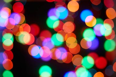 Kırmızı ve turuncu, yeşil, mavi tatil bokeh. Soyut arkaplan
