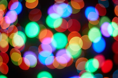 Kırmızı ve turuncu, yeşil, mavi tatil bokeh. Soyut arkaplan