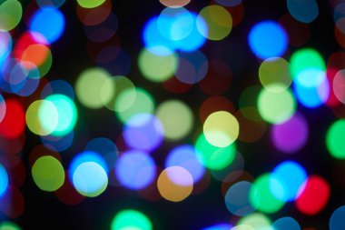 Kırmızı ve turuncu, yeşil, mavi tatil bokeh. Soyut arkaplan