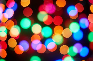 Kırmızı ve turuncu, yeşil, mavi tatil bokeh. Soyut arkaplan