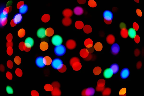 Röd och orange, grön, blå julbokeh. Abstrakt bakgrund — Stockfoto
