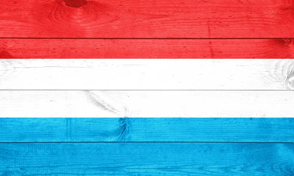 木の板に描かれたルクセンブルク国旗のイラスト — ストック写真