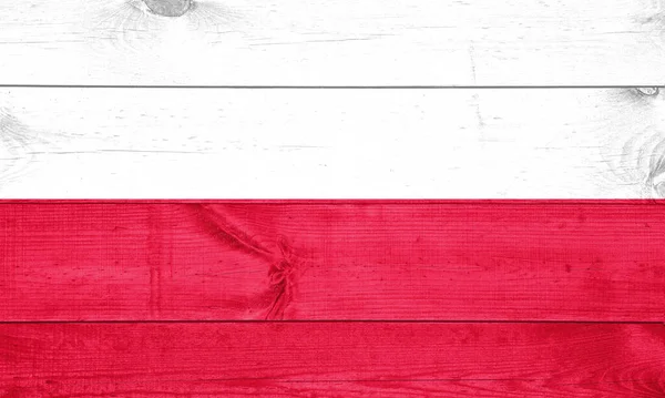 古い木製の壁に明るい塗料の色で描かれたポーランドの旗 ざらざらとした背景に書かれた旗 — ストック写真