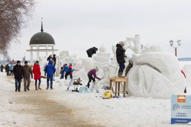 Construction of snow sculptures at the International Winter Festival 