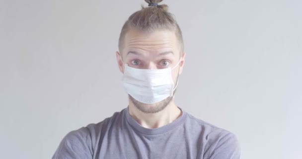 Young Blond Hair Caucasian Male Using Disposable Face Mask Covid — Stock Video