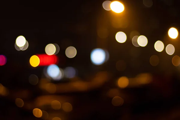 Abstract wazig beeld van bokeh lichten in de stad — Stockfoto