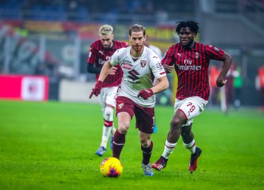 Cristian Ansaldi of Torino FC fights for the ball against Franck Kessie of AC Milan during the Serie A 2019/20 match between AC Milan vs Torino FC at the San Siro Stadium, Milan, Italy on February 17, 2020 - Photo Fabrizio Carabelli /LM clipart