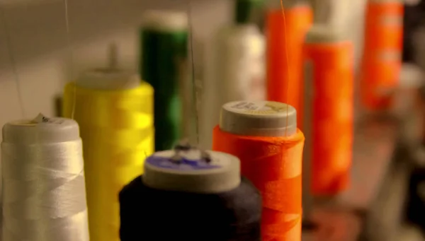 Colorful yarn on spool, yarn on tube, cotton, wool, linen thread. — Stock Photo, Image