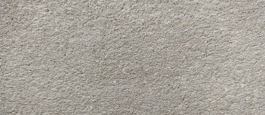 Parlak ince taneli kumlu doku, doğal yapı. Taş dokusuyla karşı karşıya. Ve ince kırıntı kahverengi ton arkaplan..