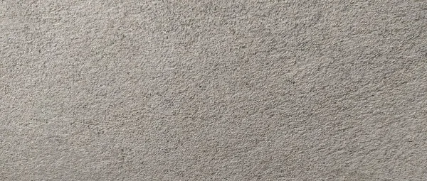 Parlak ince taneli kumlu doku, doğal yapı. Taş dokusuyla karşı karşıya. Ve ince kırıntı kahverengi ton arkaplan..