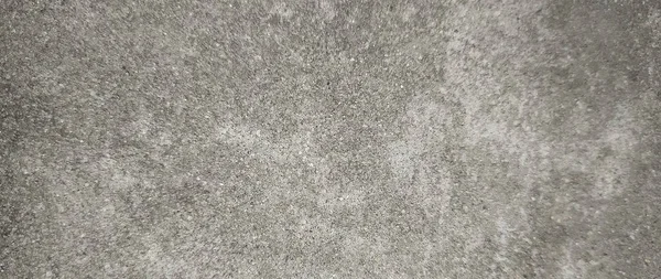 Parlak ince taneli kumlu doku, doğal yapı. Taş dokusuyla karşı karşıya. Ve ince kırıntı kahverengi ton arkaplan..