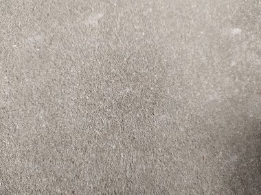 Parlak ince taneli kumlu doku, doğal yapı. Taş dokusuyla karşı karşıya. Ve ince kırıntı kahverengi ton arkaplan..