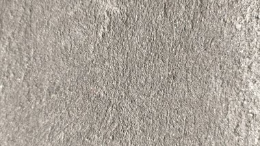 Parlak ince taneli kumlu doku, doğal yapı. Taş dokusuyla karşı karşıya. Ve ince kırıntı kahverengi ton arkaplan..
