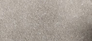 Parlak ince taneli kumlu doku, doğal yapı. Taş dokusuyla karşı karşıya. Ve ince kırıntı kahverengi ton arkaplan..