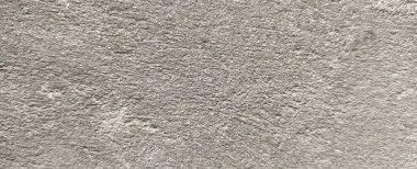 Parlak ince taneli kumlu doku, doğal yapı. Taş dokusuyla karşı karşıya. Ve ince kırıntı kahverengi ton arkaplan..