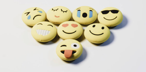 Yellow color various emotions emoji on white background with selected focus on object .