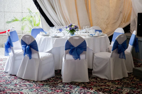 Indoor wedding reception hall with round table