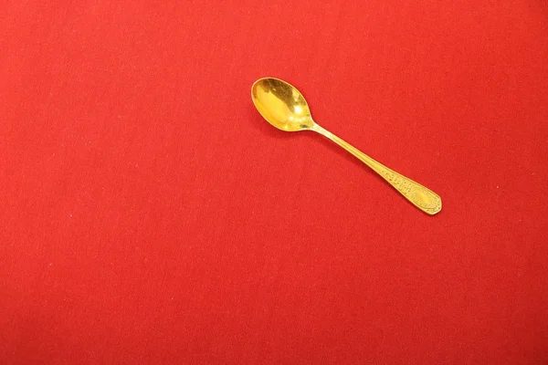 Gold Antique Teaspoon Lies Upper Right Corner Red Cloth Background — Stock Photo, Image