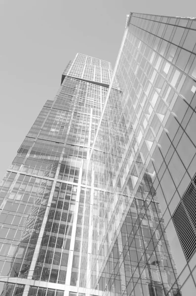 Perspective wide angle view to blue glass building skyscraper — Stock Photo, Image