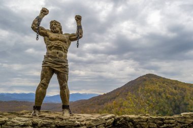 Sochi, Russia - November, 30, 2019: Statue of Unbound Prometheus with Broken Chain on the Eagle Rocks in Sochi clipart