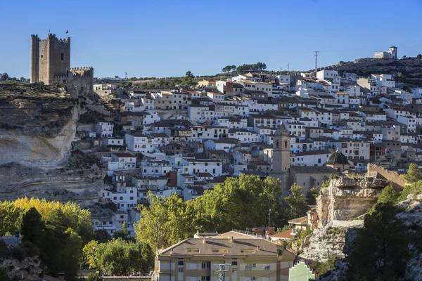 Panoramic view of the city, on top of limestone mountain is situated Castle of the 12TH century Almohad origin, take in Alcala of the Jucar, Albacete province, Spain — Stock Photo, Image