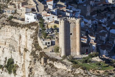 Panoramic view of the valley of the river Jucar during autumn, on top of limestone mountain is situated Castle of the 12TH century Almohad origin, take in Alcala del Jucar, Albacete province, Spain clipart