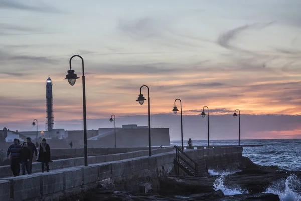 Castle of San Sebastian at sunset, fortress on a smail island separated from the main city, according classical tradition, there was a Temple of Kronos, cultural landmark of the city, Cadiz, Spain — Stock Photo, Image